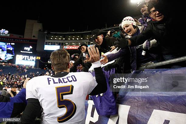 Joe Flacco of the Baltimore Ravens celebrates after defeating the New England Patriots in the 2013 AFC Championship game at Gillette Stadium on...