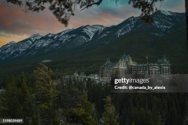 fairmont banff springs sunset 3 - banff springs hotel stock pictures, royalty-free photos & images