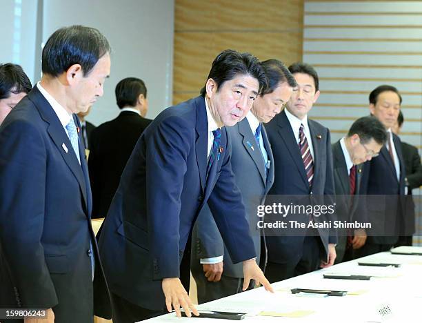 Japanese Prime Minister Shinzo Abe attends an emergency meeting on Japanese hostage at Algerian plant at his official residence on January 20, 2013...