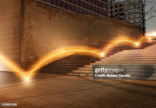 ligh trail bouncing down steps. - lichtspur stock-fotos und bilder