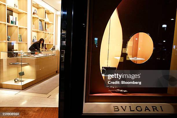 An employee works inside a Bulgari SpA store, a luxury unit of LVMH Moet Hennessy Louis Vuitton SA, in the Omotesando district of Tokyo, Japan, on...
