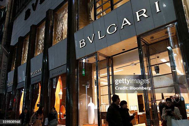 Pedestrians walk past a Bulgari SpA store, a luxury unit of LVMH Moet Hennessy Louis Vuitton SA, in the Ginza district of Tokyo, Japan, on Sunday,...