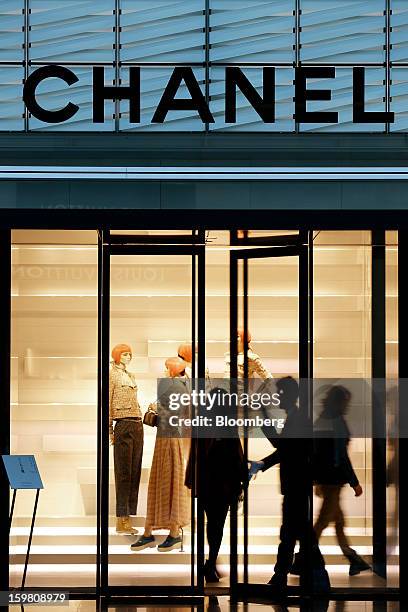 Customers enter a Chanel SA store in the Ginza district of Tokyo, Japan, on Sunday, Jan. 20, 2013. Japan's consumer prices excluding fresh food, a...