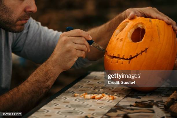 getting ready for halloween - carving food stock pictures, royalty-free photos & images