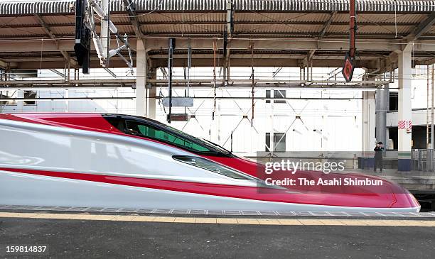 The lead vehicle of the new 'E6' Type Akita Shinkansen 'Super Komachi' is seen at the platform during a press preview at JR Omiya Station on January...