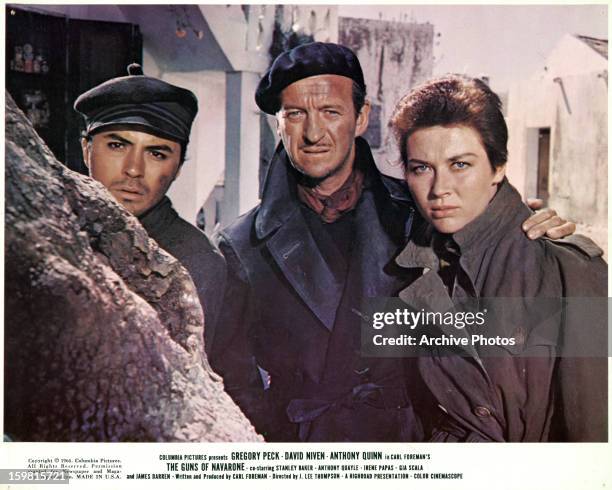 James Darren and David Niven along with Gia Scala in a scene from the film 'The Guns Of Navarone', 1961.