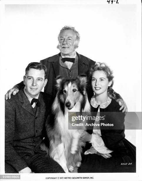 Tom Drake, Edmund Gwenn, Janet Leigh and Lassie pose for publicity portrait for the film 'Hills Of Home', 1948.