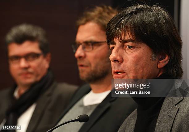 Joachim Loew, head coach of German National Team, speaks next to Juergen Klopp, head coach of Borussia Dortmund, and Herbert Fandel, head of the DFB...