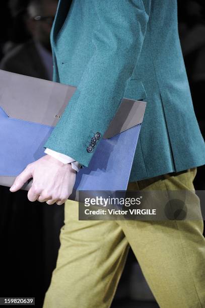 Model walks the runway during the Paul Smith Ready to Wear Fall/Winter 2013-2014 show as part of Paris Fashion Week on January 20, 2013 in Paris,...