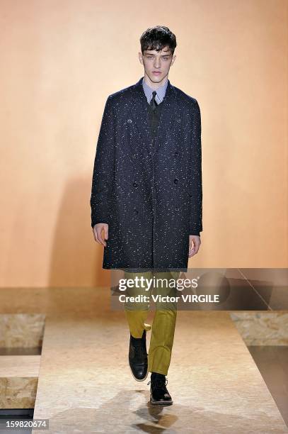 Model walks the runway during the Paul Smith Ready to Wear Fall/Winter 2013-2014 show as part of Paris Fashion Week on January 20, 2013 in Paris,...