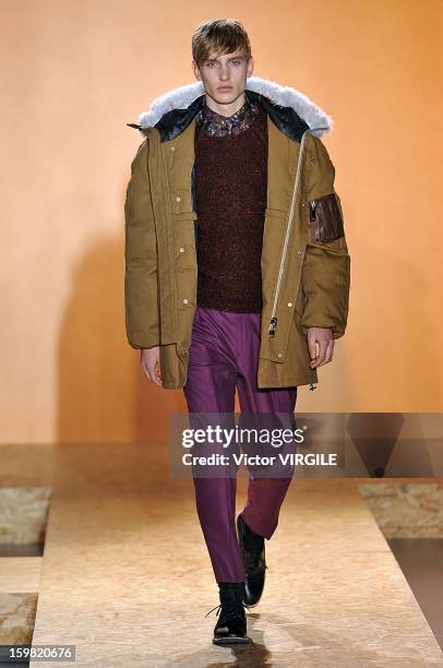 Model walks the runway during the Paul Smith Ready to Wear Fall/Winter 2013-2014 show as part of Paris Fashion Week on January 20, 2013 in Paris,...