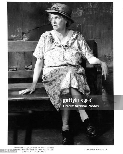 Geraldine Page sitting on bench in a scene from the film 'The Trip To Bountiful', 1985.