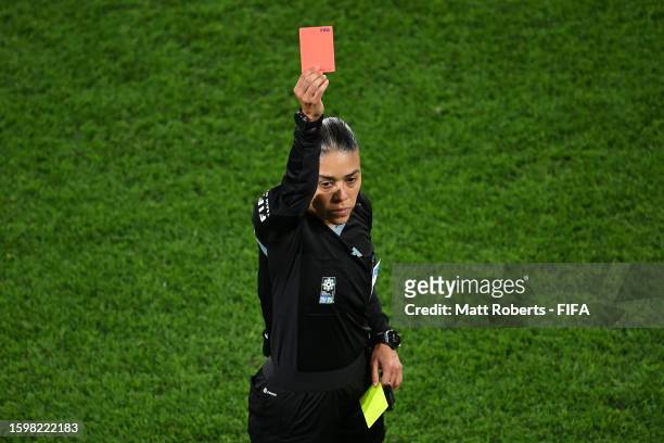 Referee Melissa Borjas shows a red card to Lauren James of England after cancelling the yellow card given to her after the Video Assistant Referee...