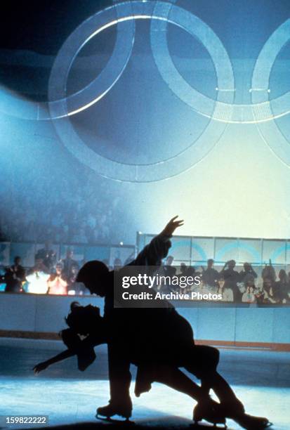 Sweeney and Moira Kelly ice skating in a scene from the film 'The Cutting Edge', 1992.