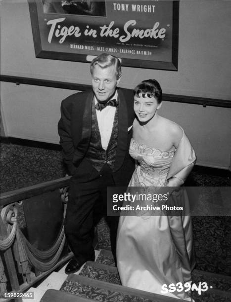 Tony Wright and Janet Munro show up for the premiere of the film 'Tiger In The Smoke', 1956.