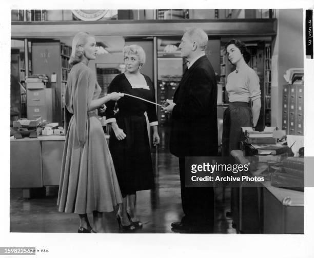 Dina Merrill, Joan Blondell, Spencer Tracy and Katharine Hepburn in a scene from the film 'Desk Set', 1957.