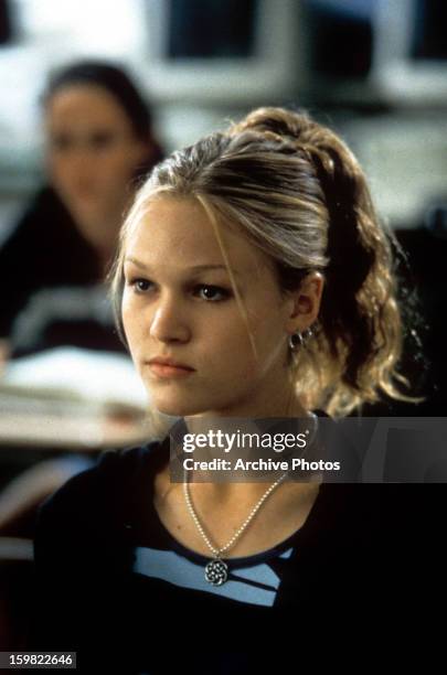 Julia Stiles sitting in class in a scene from the film '10 Things I Hate About You', 1999.