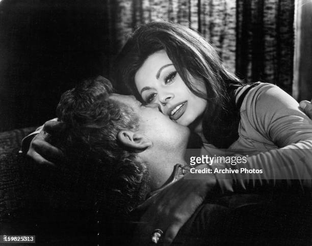 Stephen Boyd kisses Sophia Loren in a scene from the film 'The Fall Of The Roman Empire', 1964.