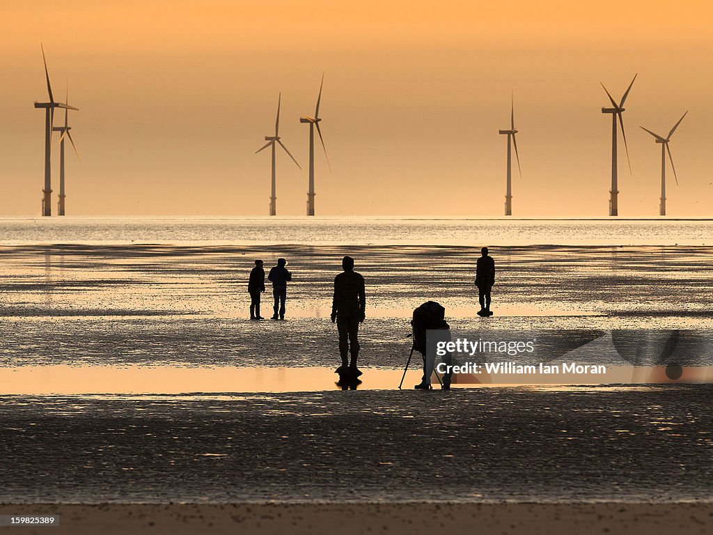 Silhouettes on the beach. Crosby
