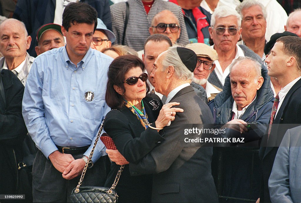 Lea Rabin Israeli Premier Shimon Peres hugs Lea Rabin, wife of assassinated ...