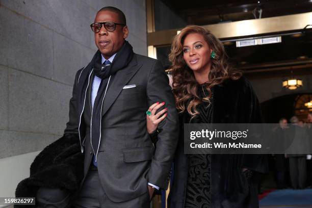 Jay-Z and Beyonce arrive at the presidential inauguration on the West Front of the U.S. Capitol January 21, 2013 in Washington, DC. Barack Obama was...