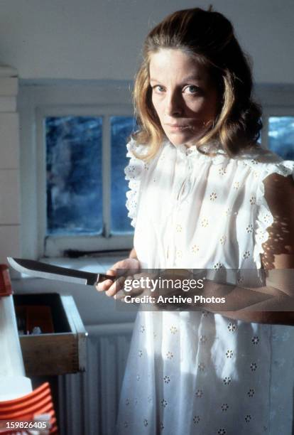 Anna Calder-Marshall holds a knife in a scene from the television series 'Hammer House Of Horror', 1980.