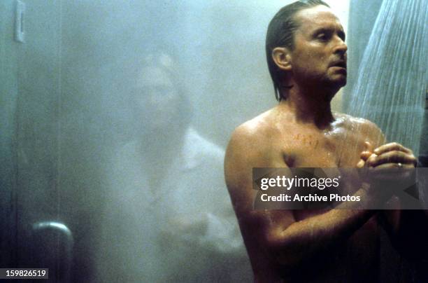 Michael Douglas in the shower in a scene from the film 'Disclosure', 1994.