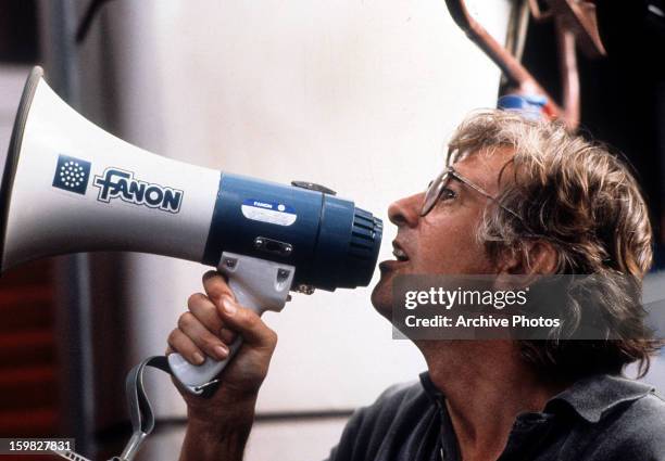 Director Paul Verhoeven on megaphone in between scenes from the film 'Total Recall', 1990.