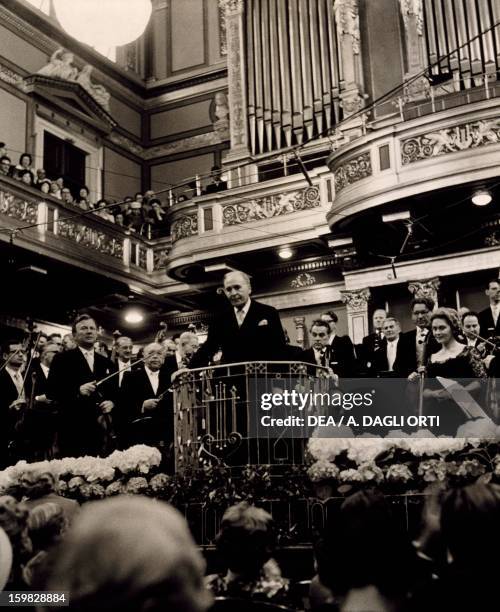 Bruno Walter, born Schlesinger , German conductor, pianist and composer on the podium of Vienna Philharmonic Orchestra. Vienna, Gesellschaft Der...