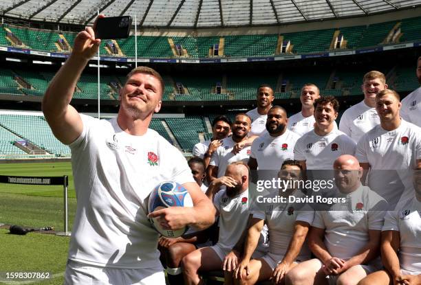 Owen Farrell, the England World Cup captain, takes a selfie with the squad during the England rugby World Cup squad announcement at Twickenham...