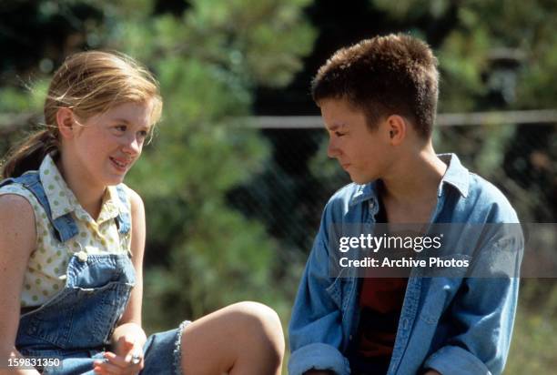 Lexi Randall and Elijah Wood in a scene from the film 'The War', 1994.