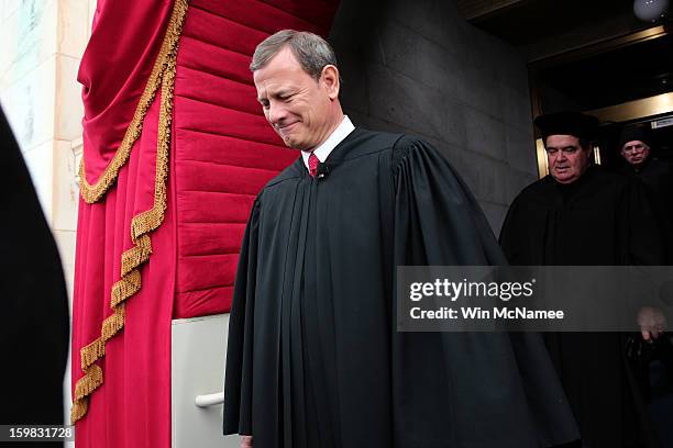 Supreme Court Chief Justice John Roberts arrives during the presidential inauguration on the West Front of the U.S. Capitol January 21, 2013 in...