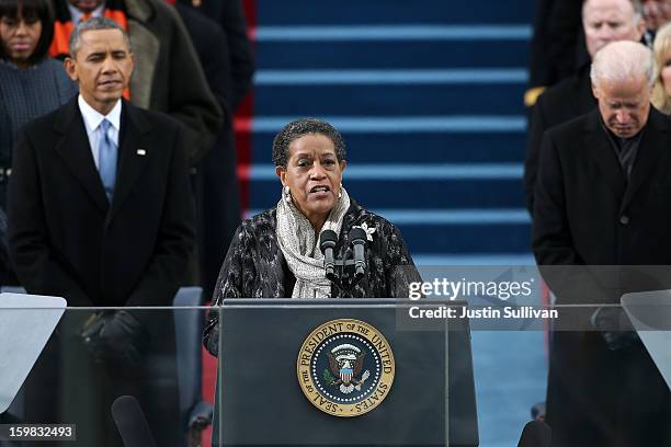 Myrlie Evers-Williams gives the invocation as U.S. President Barack Obama and U.S. Vice President Joe Biden look on during the presidential...