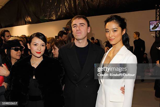 Zhang Ziyi, Raf Simons and Eriko Hastune attend the Christian Dior Spring/Summer 2013 Haute-Couture show as part of Paris Fashion Week on January 21,...