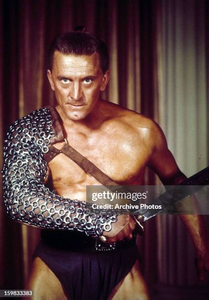 Kirk Douglas the slave Spartacus, ready to fight in a scene from the film 'Spartacus', 1960.