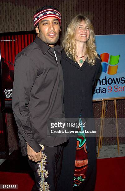 Recording artist Ben Harper and actress Laura Dern arrive at a screening of the film "Standing in the Shadows of Motown" at the Apollo Theater...