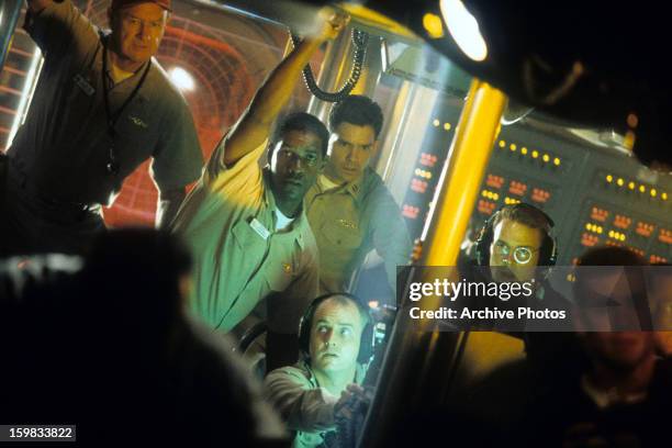 Gene Hackman and Denzel Washington in the control room in a scene from the film 'Crimson Tide', 1995.