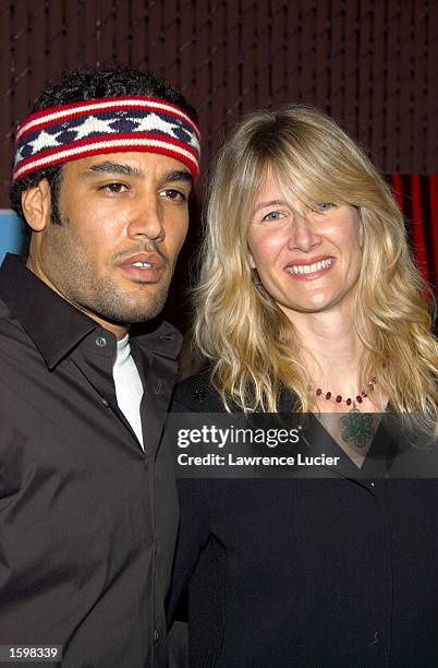 Recording artist Ben Harper and Laura Dern arrive at a screening of the film "Standing in the Shadows of Motown" at the Apollo Theater November 7,...