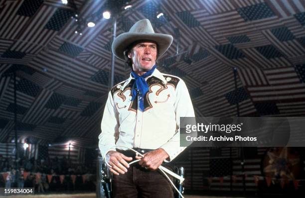 Clint Eastwood in full cowboy attire in a scene from his 1980 film, 'Bronco Billy'.