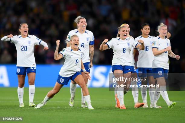 Chloe Kelly of England celebrates scoring her team's fifth and winning penalty in the penalty shoot out during the FIFA Women's World Cup Australia &...