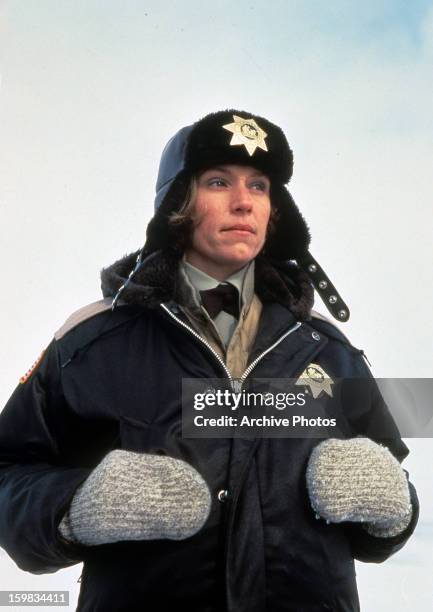 Frances McDormand bundled up in police uniform in a scene from the film 'Fargo', 1996.