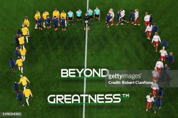 Players from Australia and Denmark walk onto the pitch ahead of the FIFA Women's World Cup Australia & New Zealand 2023 Round of 16 match between...