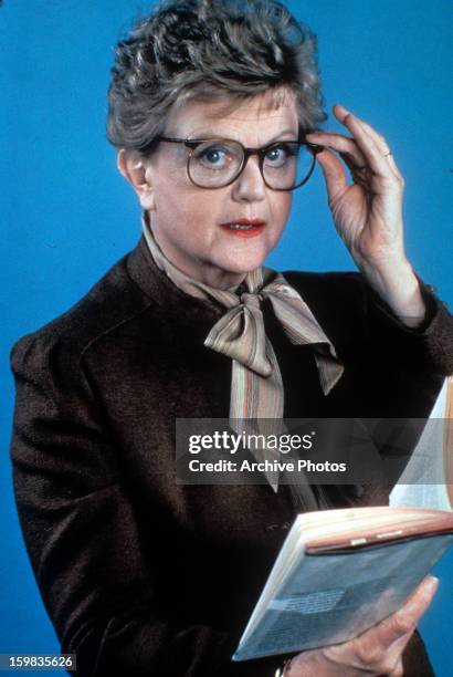 Angela Lansbury holds a book in publicity portrait for the television series 'Murder, She Wrote', Circa 1984.