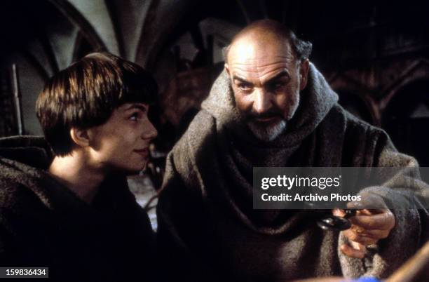 Christian Slater is approached by Sean Connery in a scene from the film 'The Name Of The Rose', 1986.