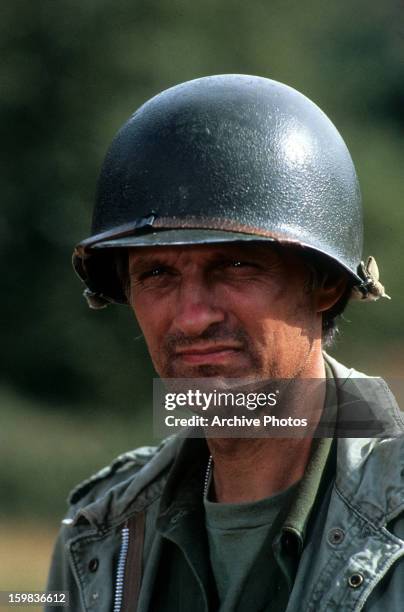 Alan Alda wearing helmet in a scene from the film 'M*A*S*H', Circa 1978.