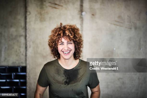 portrait of laughing woman with stained t-shirt - white shirt stain stock pictures, royalty-free photos & images