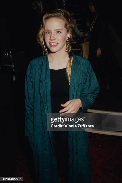 Amanda Peterson attends a red carpet event, United States, circa 1980s.