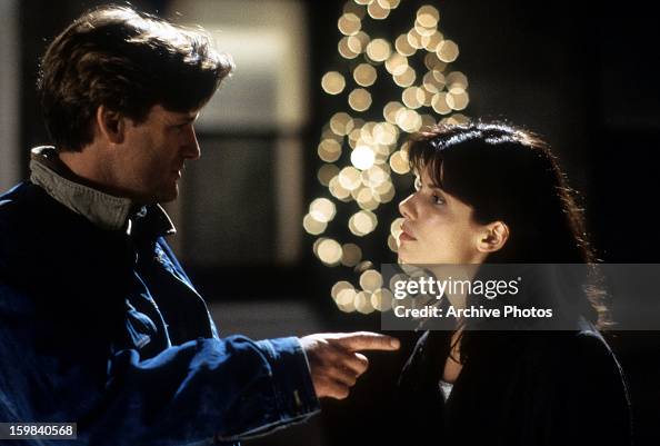 Bill Pullman and Sandra Bullock in a scene from the film 'While