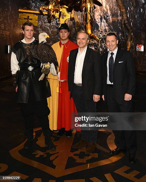 Remy Pagani , Mayor of Geneva poses with Jean-Marc Pontroue , CEO of Roger Dubuis and an eagle at the opening ceremony of the Roger Dubuis booth...