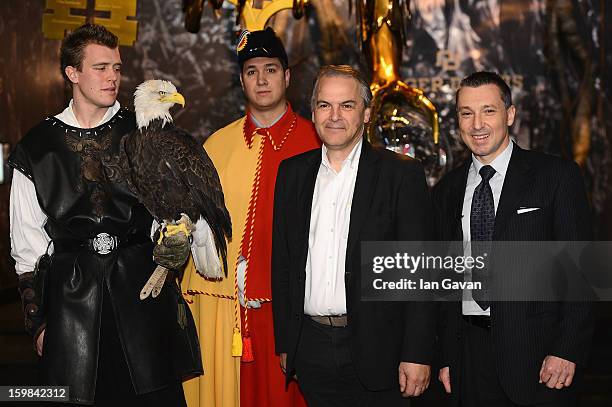 Remy Pagani , Mayor of Geneva poses with Jean-Marc Pontroue , CEO of Roger Dubuis and an eagle at the opening ceremony of the Roger Dubuis booth...